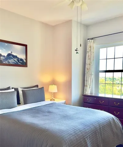 a view of front door and bedroom