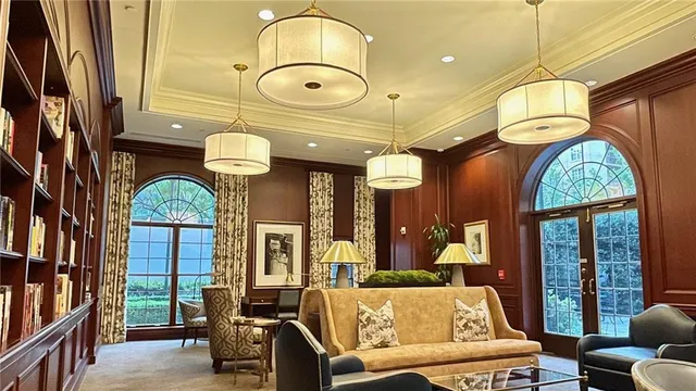 a view of a house with a yard porch and sitting area