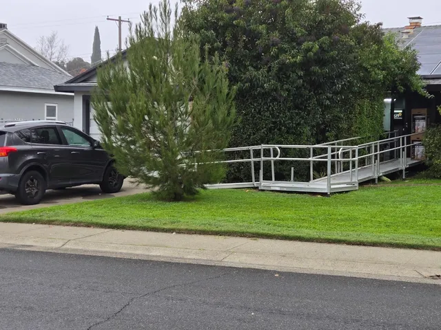 a house view with a garden space