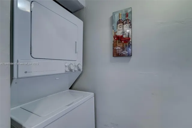 a view of storage and utility room with racks on the wall