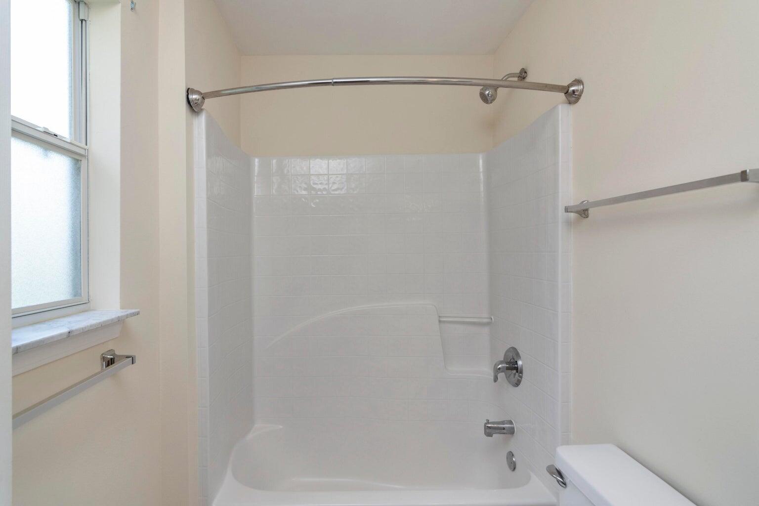 168 Cabana Way Crestview, FL 32536 - Photo 19 of 29 a bathroom with a shower and a toilet