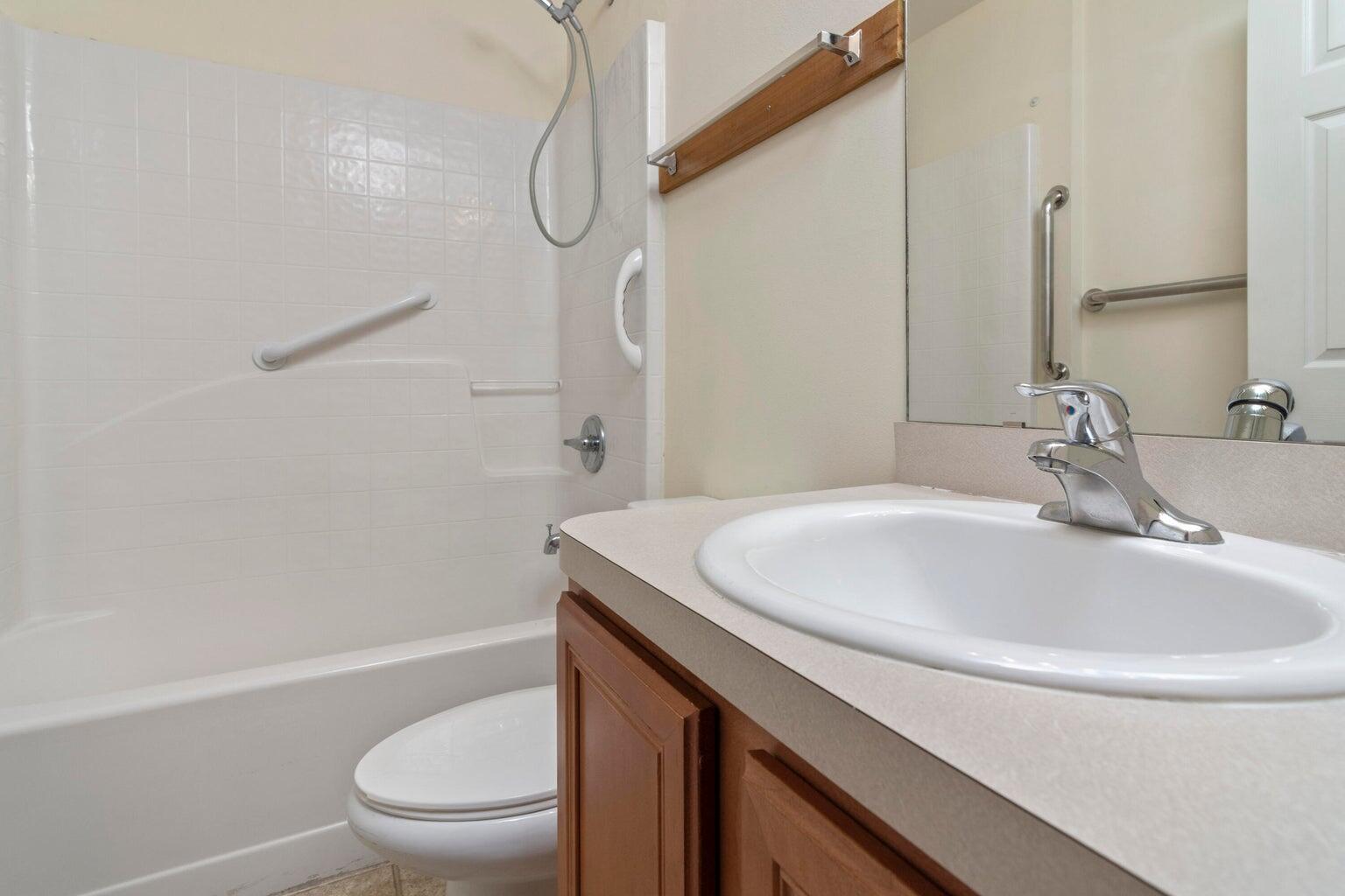 168 Cabana Way Crestview, FL 32536 - Photo 22 of 29 a bathroom with a sink a toilet and a bathtub