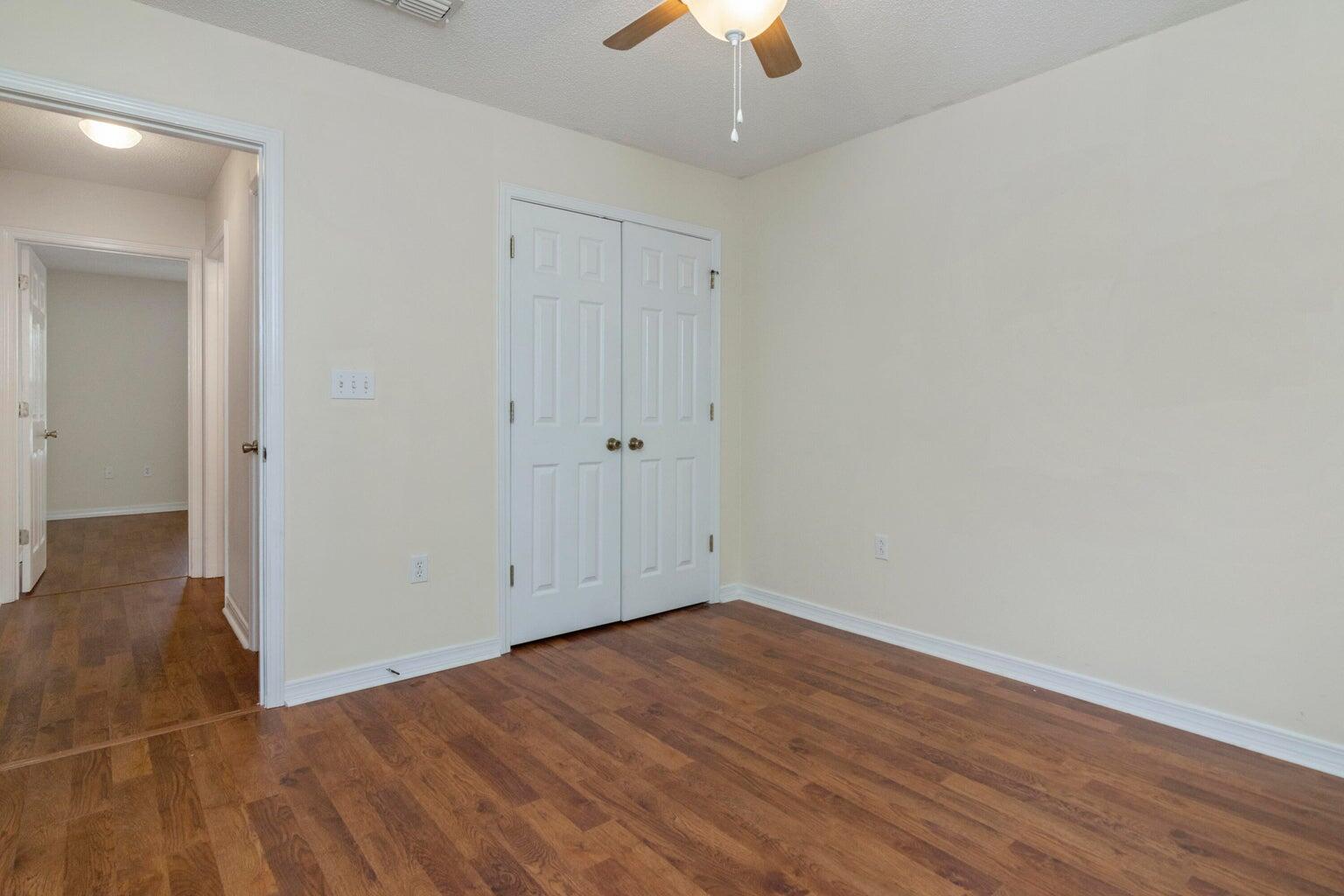 168 Cabana Way Crestview, FL 32536 - Photo 23 of 29 wooden floor in an empty room