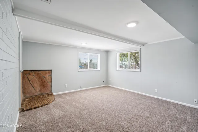 an empty room with windows