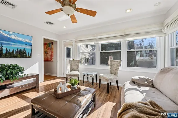 a living room with furniture and window