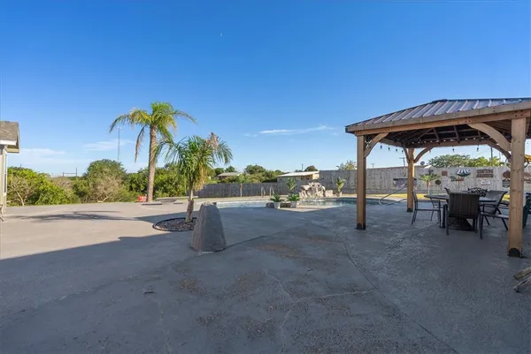 a view of a street with a sitting space