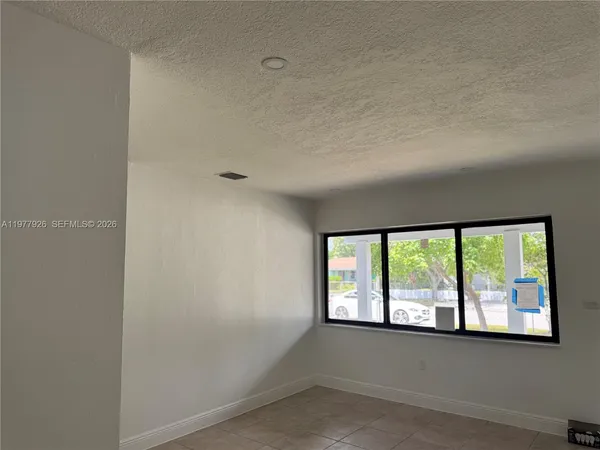 an empty room with a window