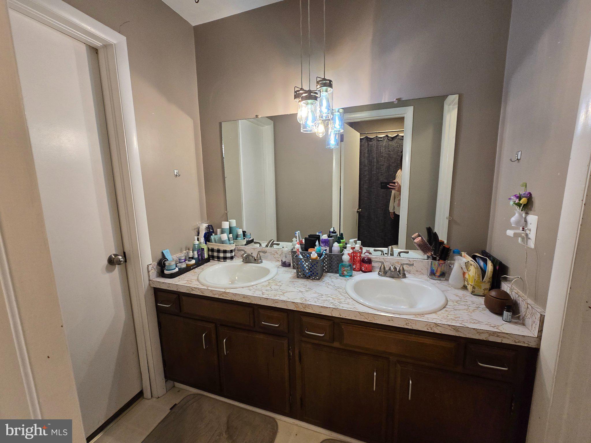 107 Keystone Hls Road, Unit 404 Factoryville, PA 18419 - Photo 16 of 27 Modern bathroom with elegant lighting.