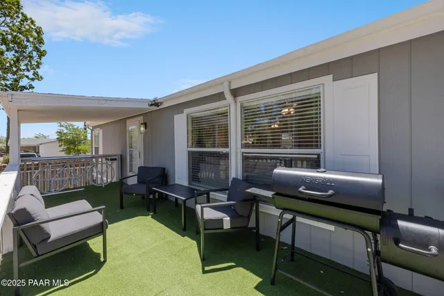 a outdoor living space with furniture