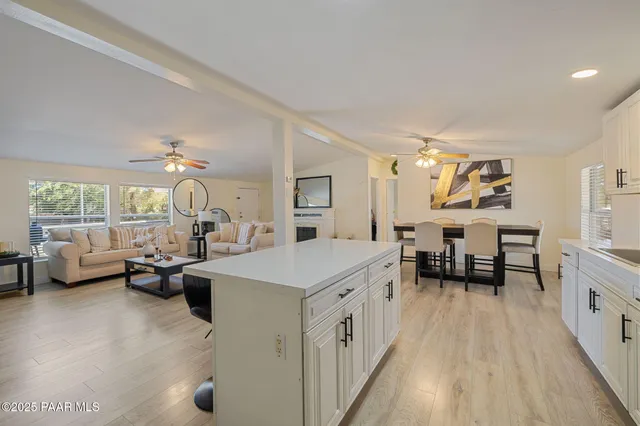 a very nice looking living room with a large window