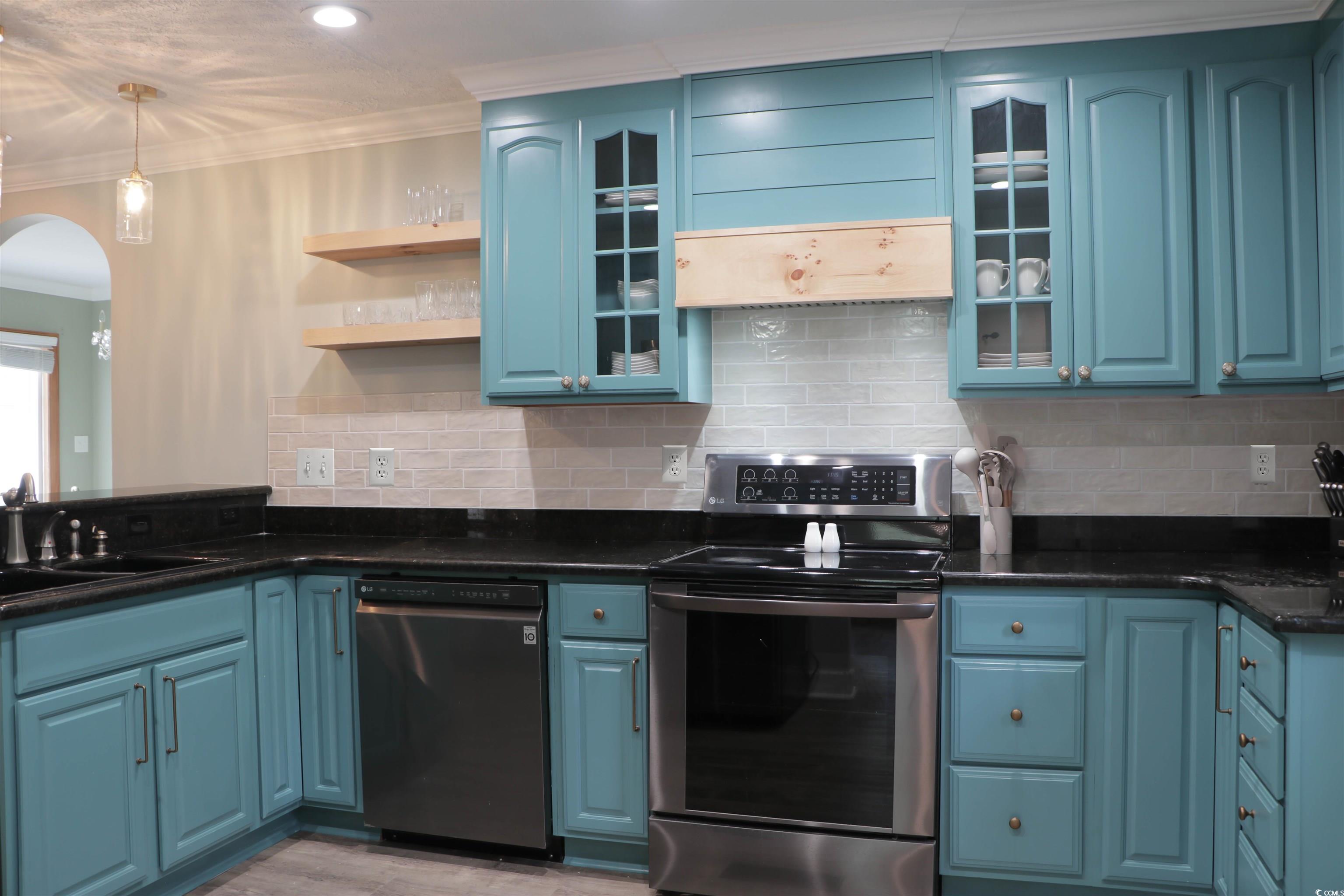 1014 Bay Drive Surfside Beach, SC 29575 - Photo 11 of 27 Kitchen featuring electric stove, dishwashing machine, blue cabinetry, a sink, and ornamental molding