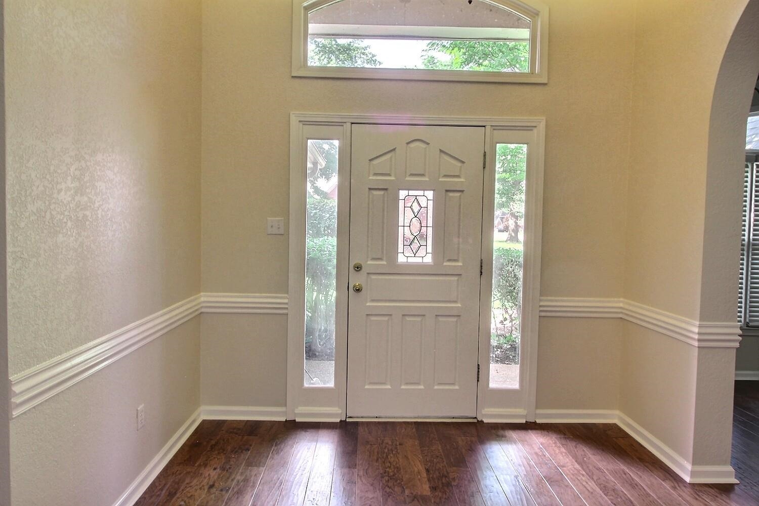 275 Home Place Collierville, TN 38017 - Photo 2 of 23 wooden floor in an empty room