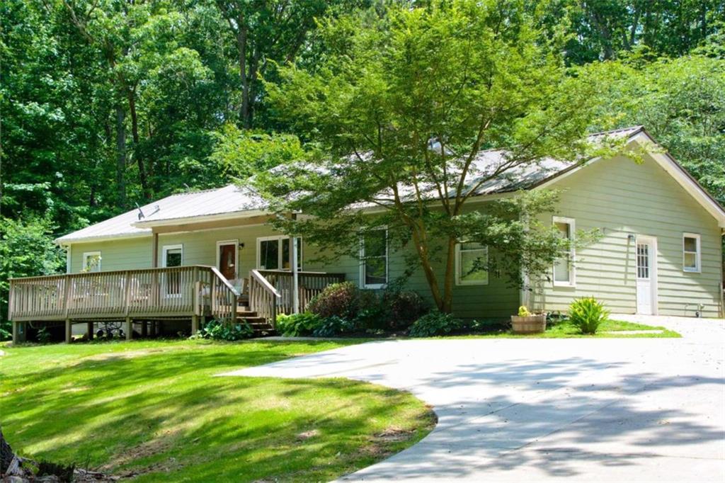 120 Mclendon Road Temple, GA 30179 - Photo 1 of 1 a view of a house with a backyard