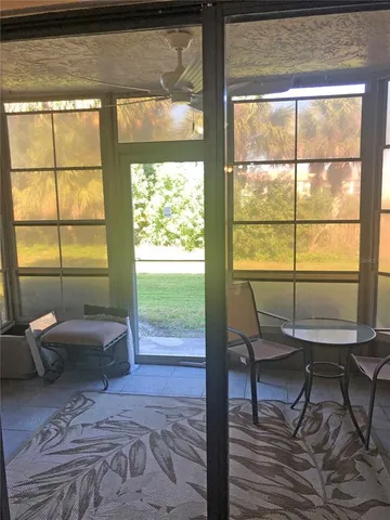 a living room with a large window