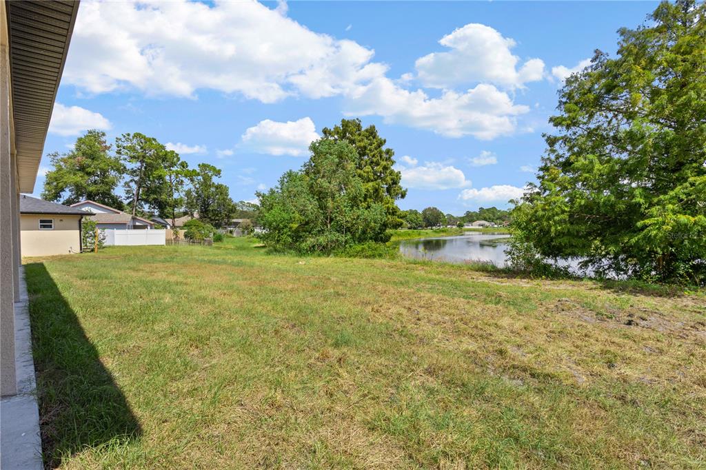 33328 County Road 473 Leesburg, FL 34788 - Photo 23 of 28 a view of a big yard with lots of green space