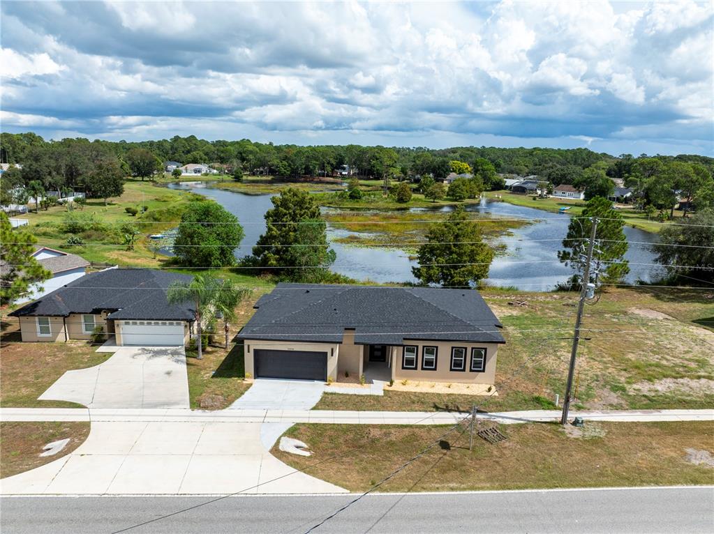 33328 County Road 473 Leesburg, FL 34788 - Photo 24 of 28 a view of a house with a ocean view