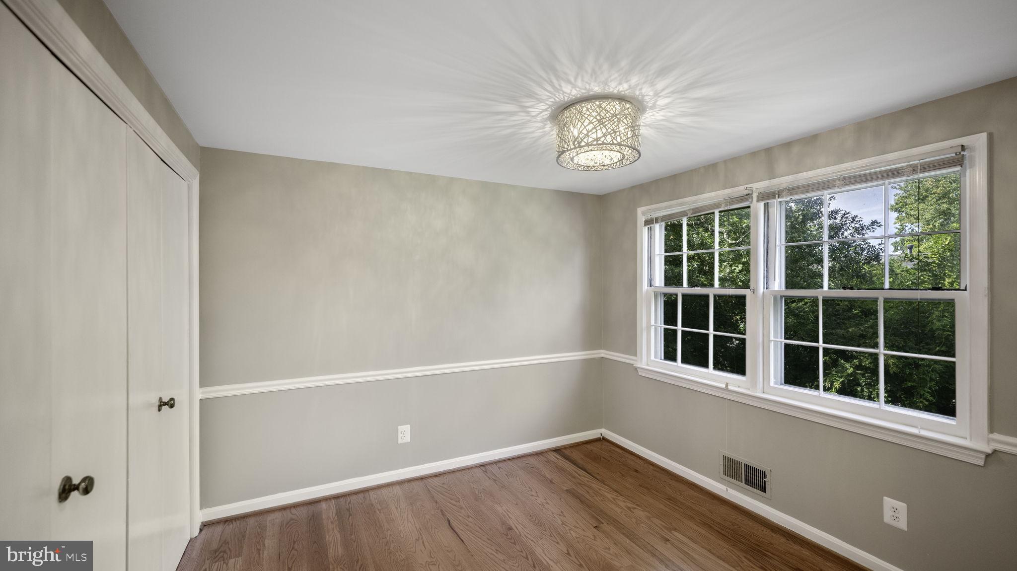 9705 Eclipse Place Montgomery Village, MD 20886 - Photo 21 of 54 a view of an empty room with a window