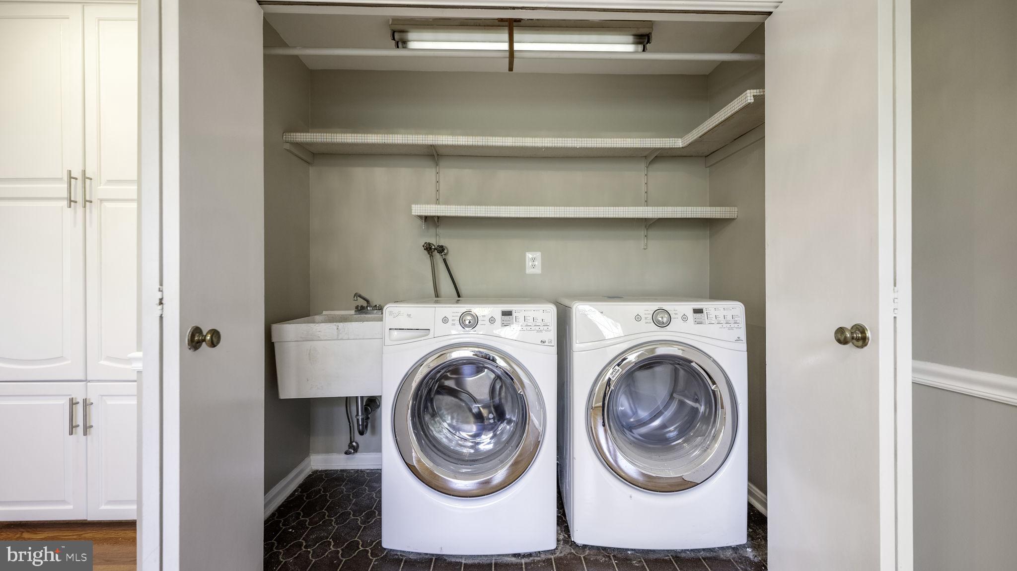 9705 Eclipse Place Montgomery Village, MD 20886 - Photo 23 of 54 a utility room with dryer and washer