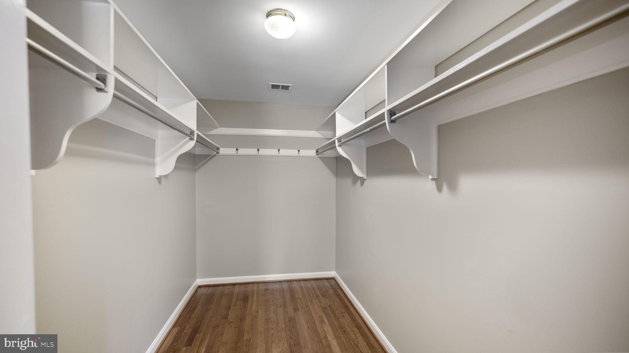 9705 Eclipse Place Montgomery Village, MD 20886 - Photo 30 of 54 a view of a room with racks on the wall