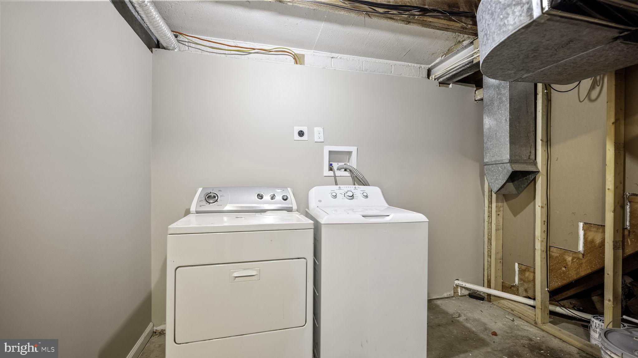 9705 Eclipse Place Montgomery Village, MD 20886 - Photo 46 of 54 a utility room with dryer and washer