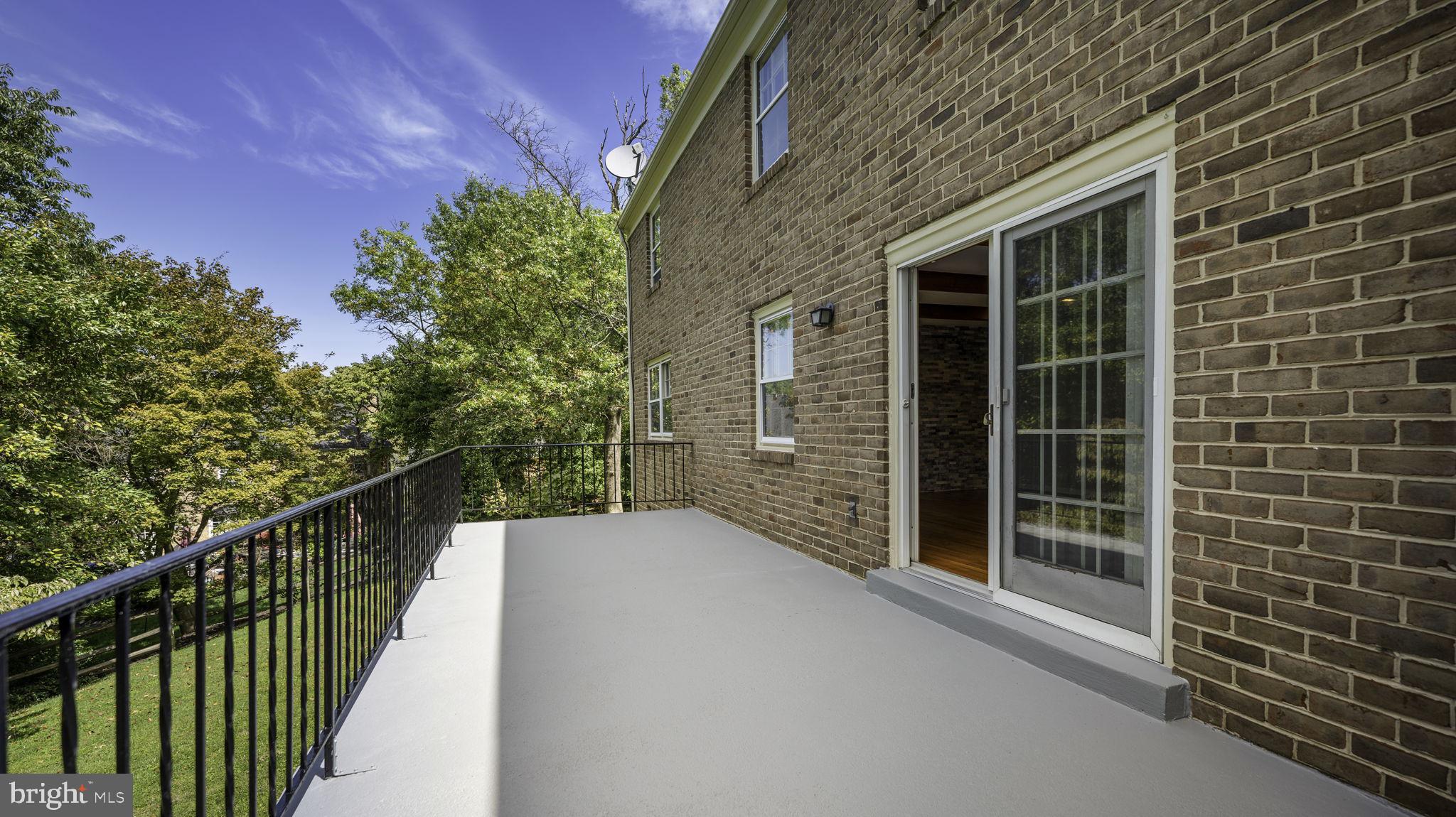 9705 Eclipse Place Montgomery Village, MD 20886 - Photo 54 of 54 a view of a balcony with a tree