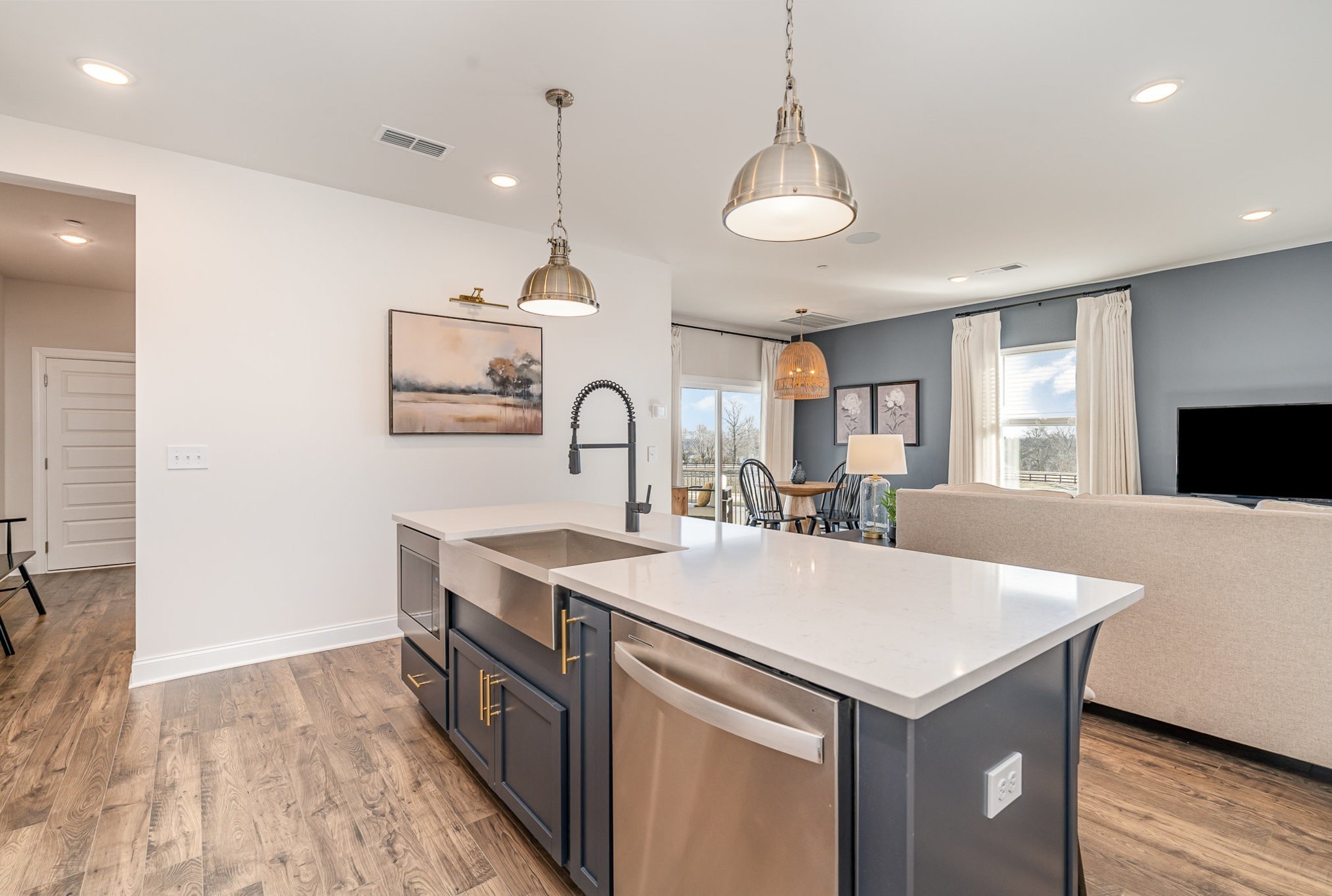 1234 Wrights Mill Road Spring Hill, TN 37174 - Photo 6 of 21 a large kitchen with kitchen island a sink appliances and a table