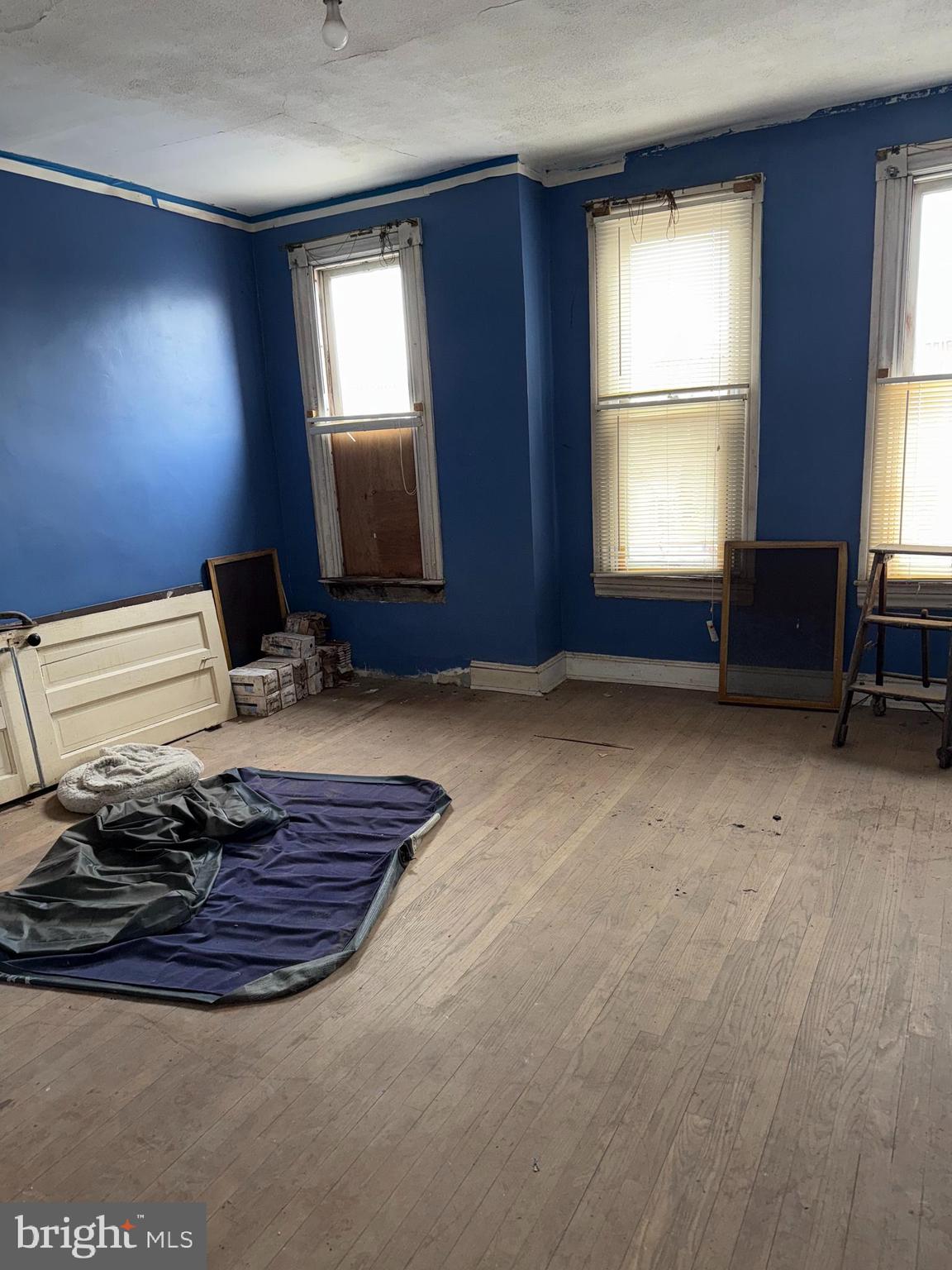 2422 Federal Street Baltimore, MD 21213 - Photo 13 of 19 a room with hard wood flooring and a window