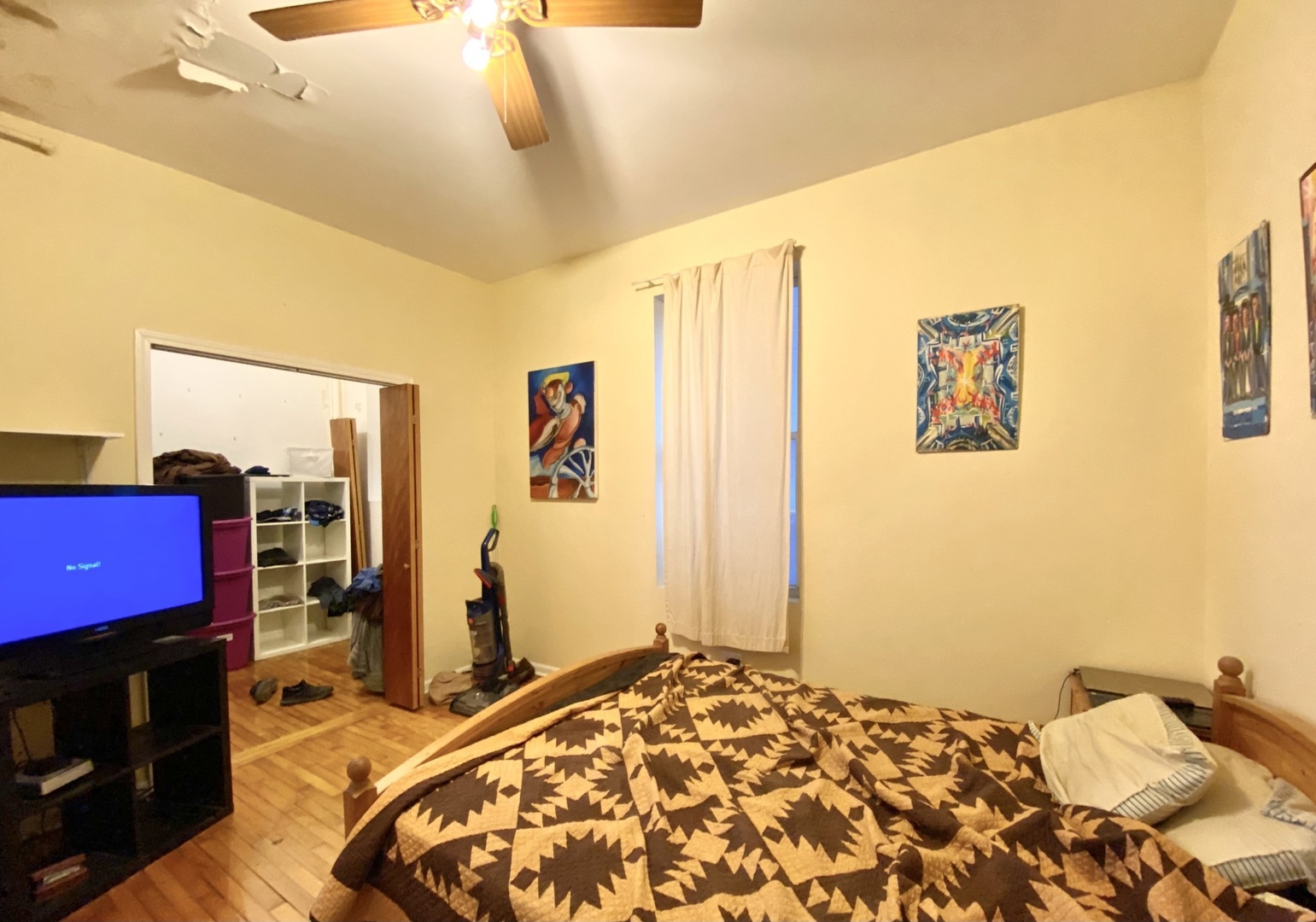 2610 West Thomas Street, Unit 1F Chicago, IL 60622 - Photo 10 of 13 a bedroom with a bed and a walk in closet