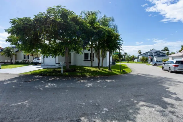 a view of a park with tree s