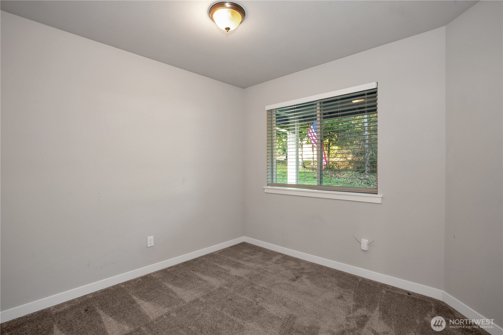 17643 Loop Lane Southeast Yelm, WA 98597 - Photo 18 of 33 an empty room with a window