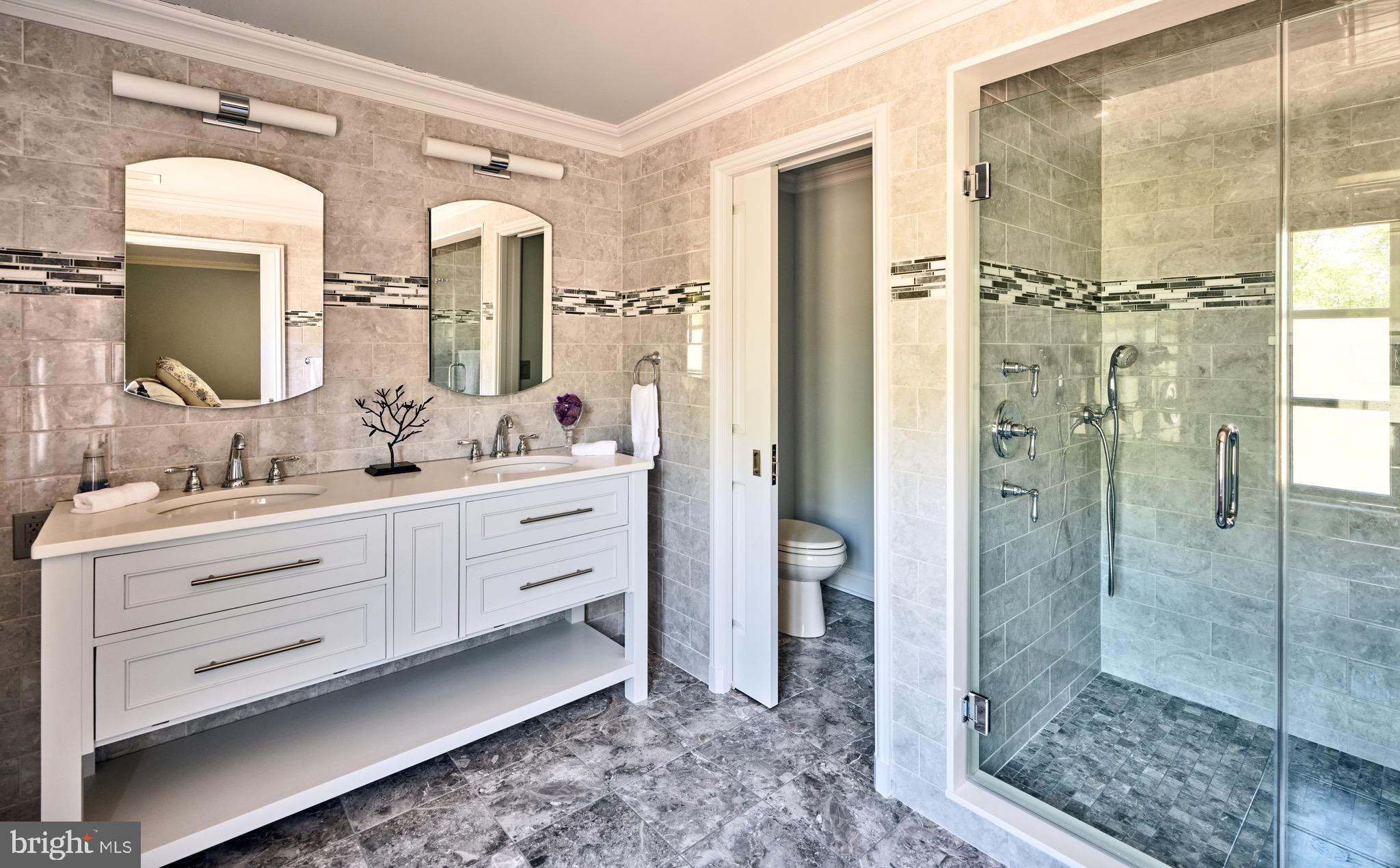 3052 River Road New Hope, PA 18938 - Photo 40 of 49 a bathroom with a double vanity sink mirror and shower