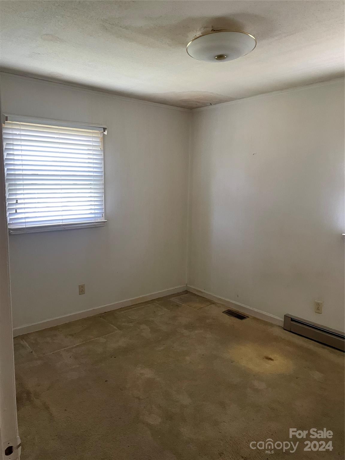 35 Bolden Drive Marion, NC 28752 - Photo 8 of 11 an empty room with a window