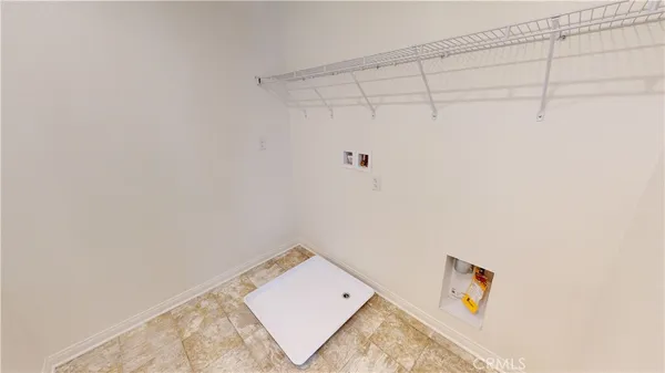 a bathroom with a bathtub shower sink vanity and mirror