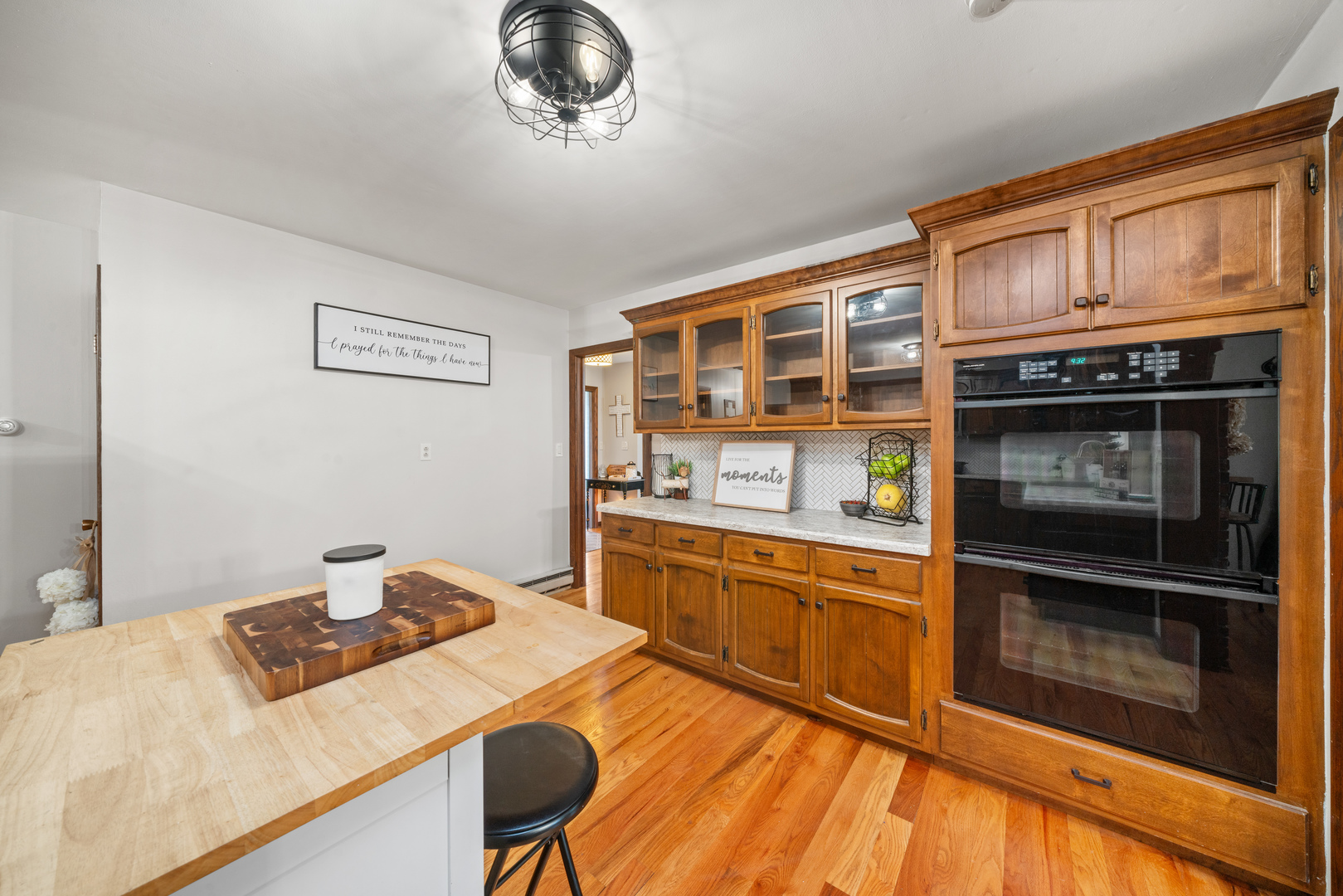 1102 Vale Street Sandwich, IL 60548 - Photo 13 of 44 a kitchen with a stove and a microwave