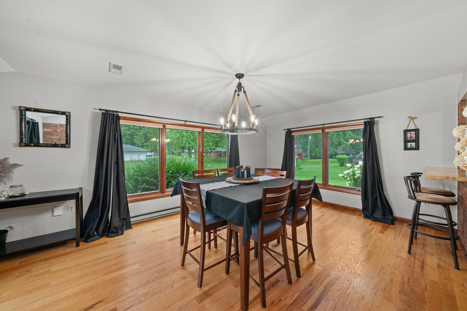 1102 Vale Street Sandwich, IL 60548 - Photo 15 of 44 a view of a dining room with furniture window and wooden floor