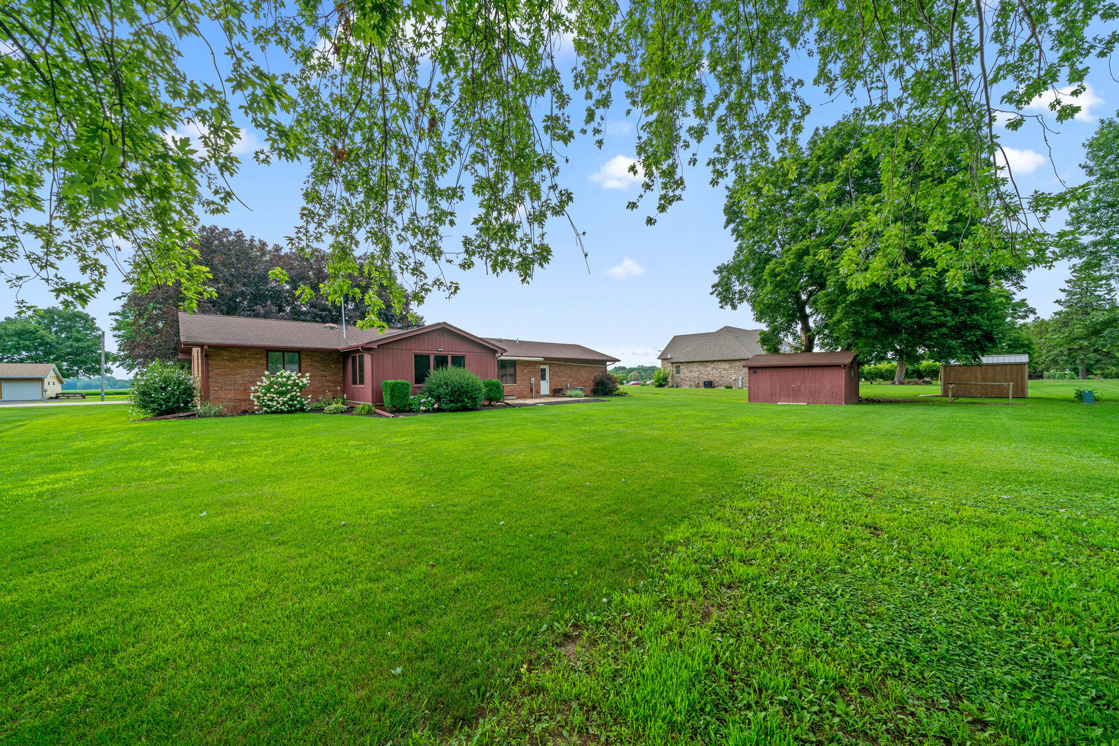 1102 Vale Street Sandwich, IL 60548 - Photo 32 of 44 a front view of house with a garden