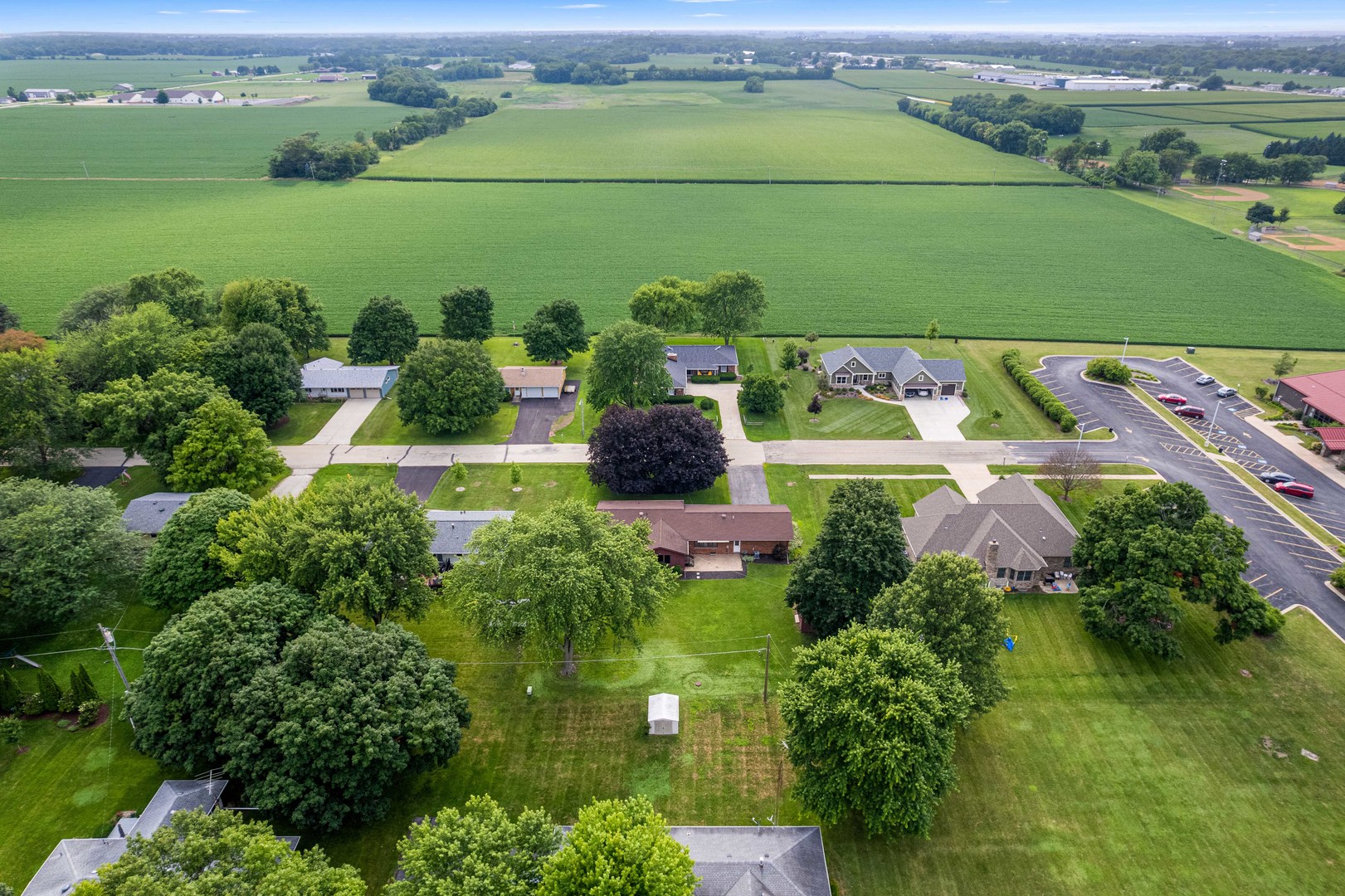 1102 Vale Street Sandwich, IL 60548 - Photo 40 of 44 an aerial view of a golf course with a ocean view