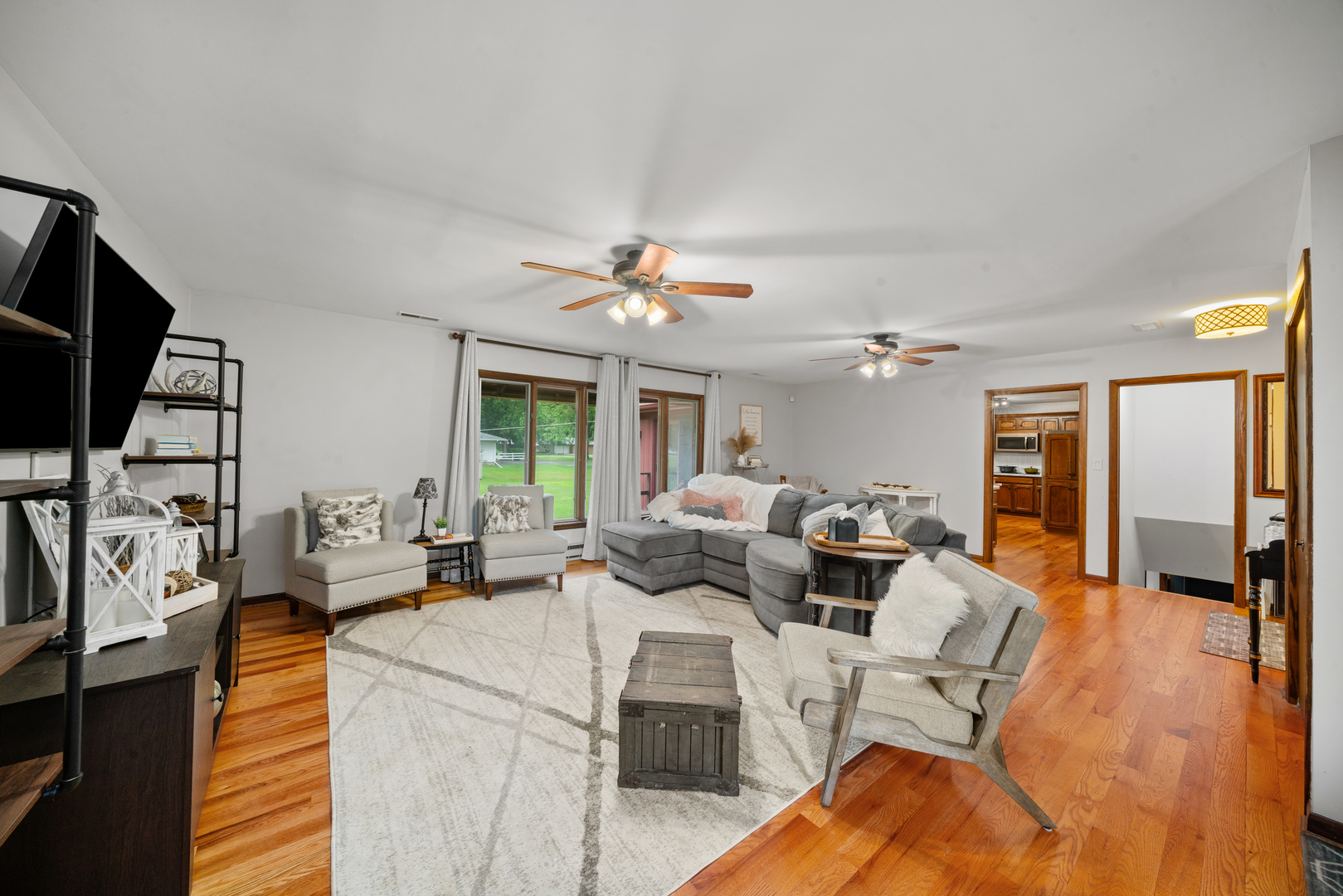 1102 Vale Street Sandwich, IL 60548 - Photo 6 of 44 a living room with furniture and a flat screen tv