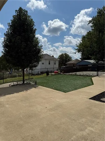a view of a street with a houses