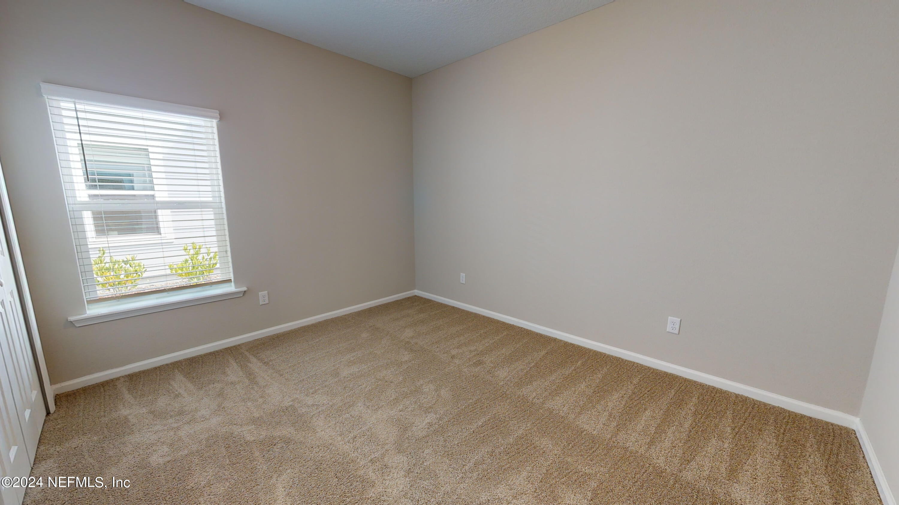 182 Holly Forest Drive St. Augustine, FL 32092 - Photo 14 of 29 an empty room with a window
