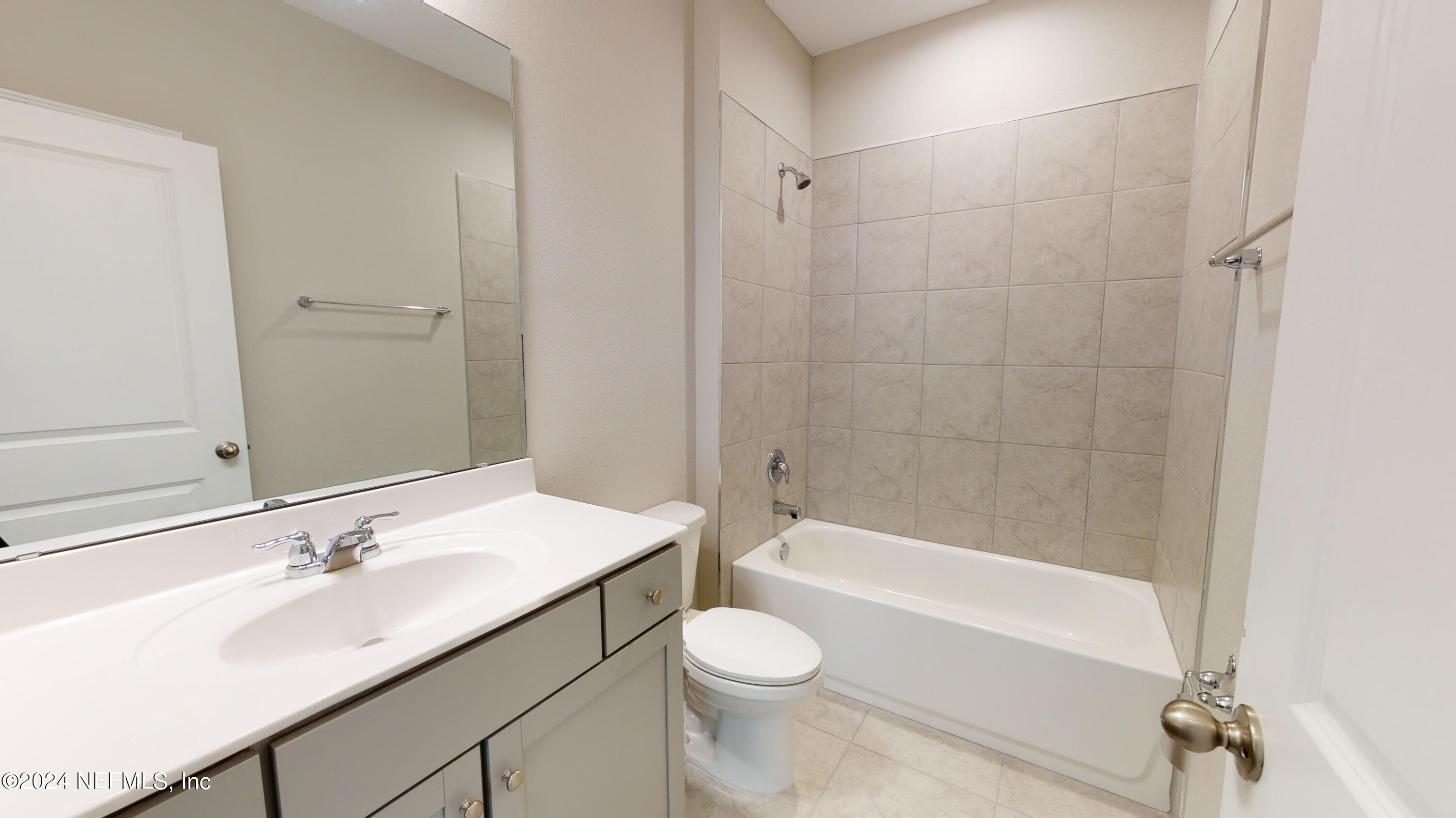 182 Holly Forest Drive St. Augustine, FL 32092 - Photo 15 of 29 a bathroom with a sink a toilet and a bathtub