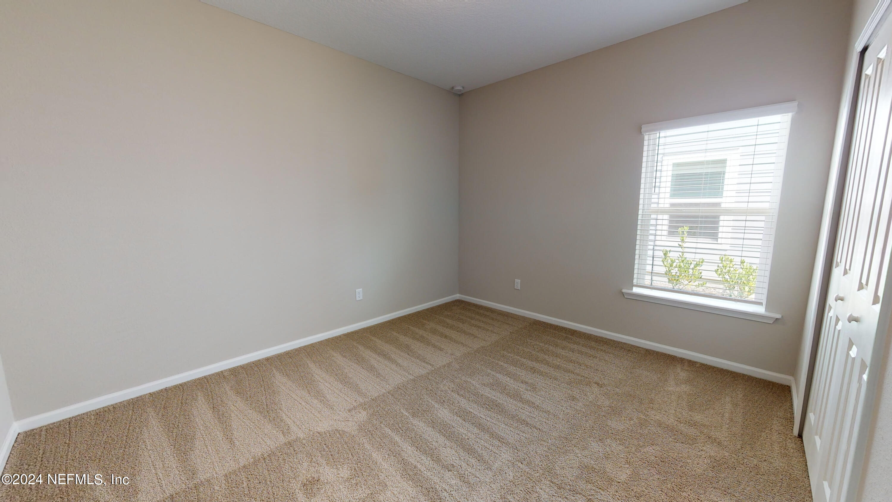 182 Holly Forest Drive St. Augustine, FL 32092 - Photo 16 of 29 an empty room with a window