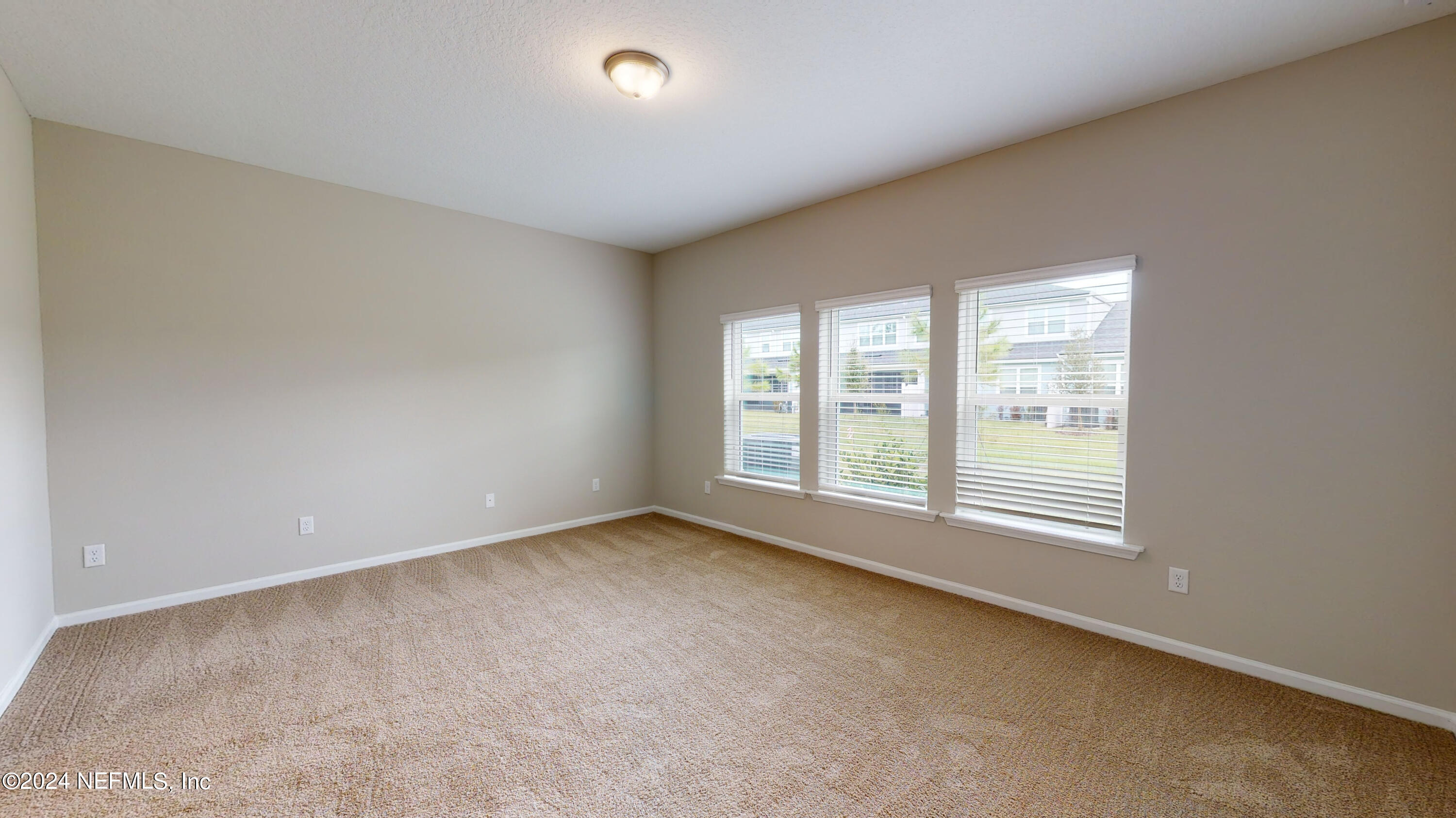 182 Holly Forest Drive St. Augustine, FL 32092 - Photo 20 of 29 an empty room with a window