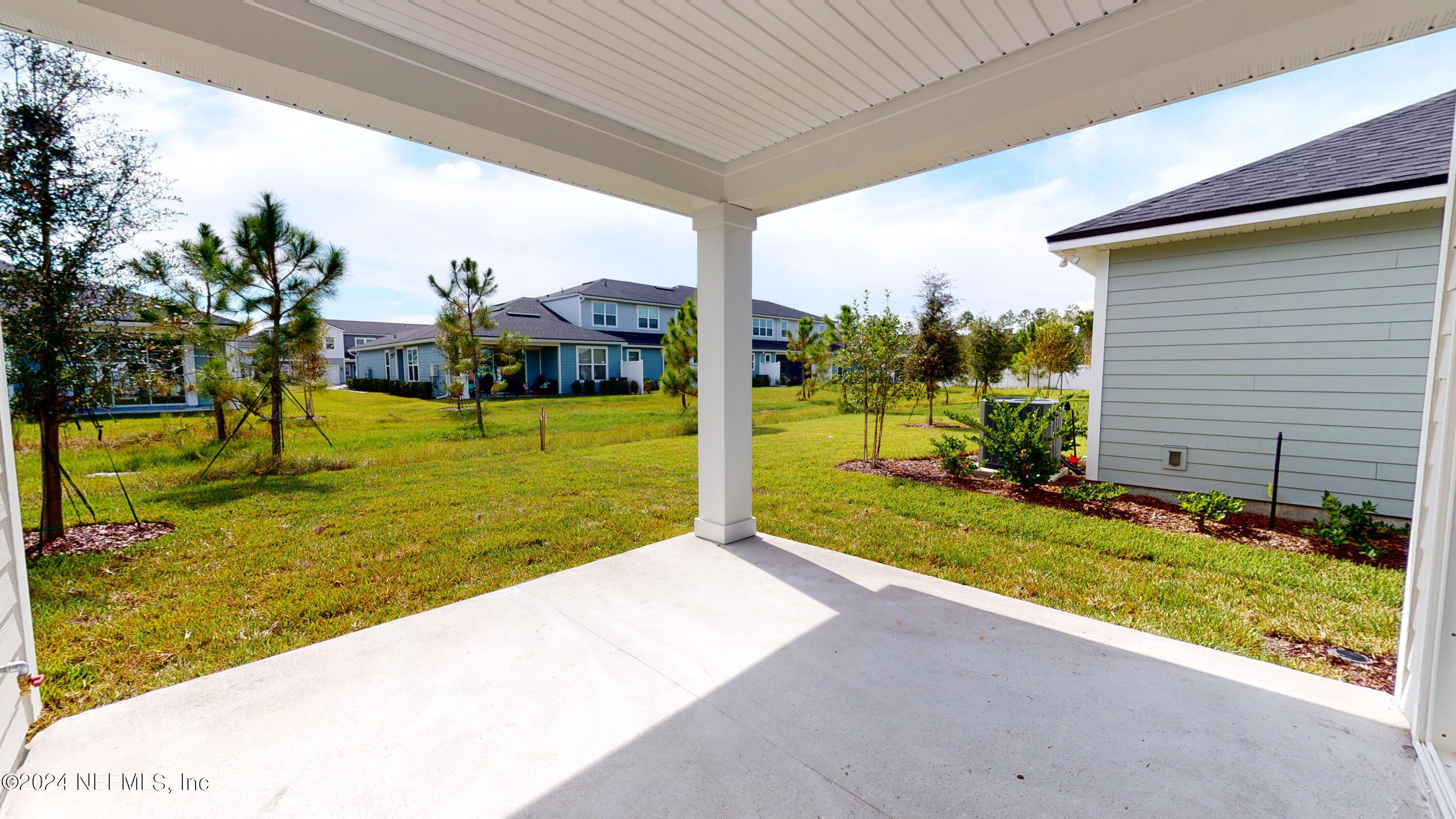 182 Holly Forest Drive St. Augustine, FL 32092 - Photo 27 of 29 a view of back yard of the house