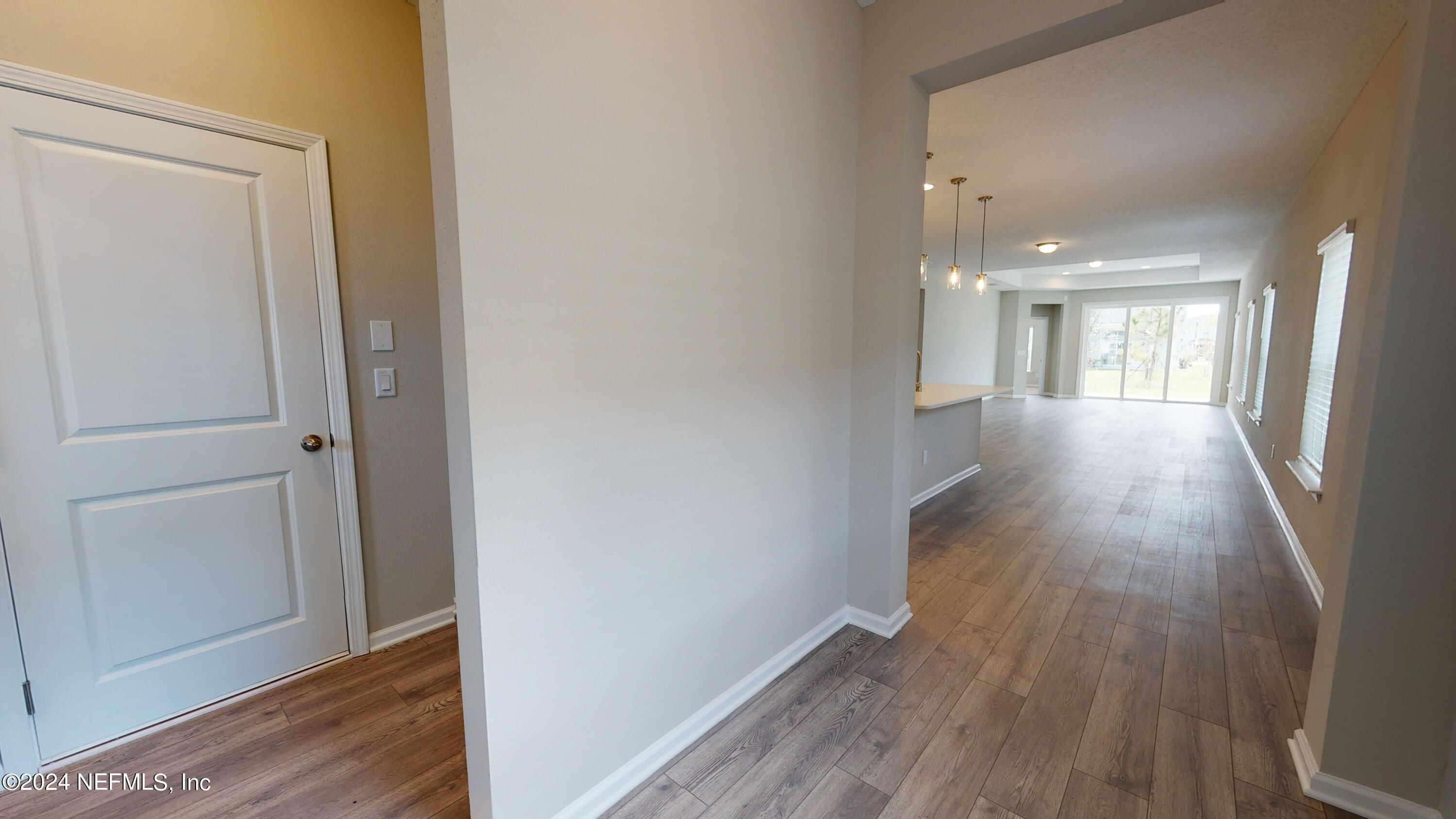 182 Holly Forest Drive St. Augustine, FL 32092 - Photo 4 of 29 a view of gallery with wooden floor
