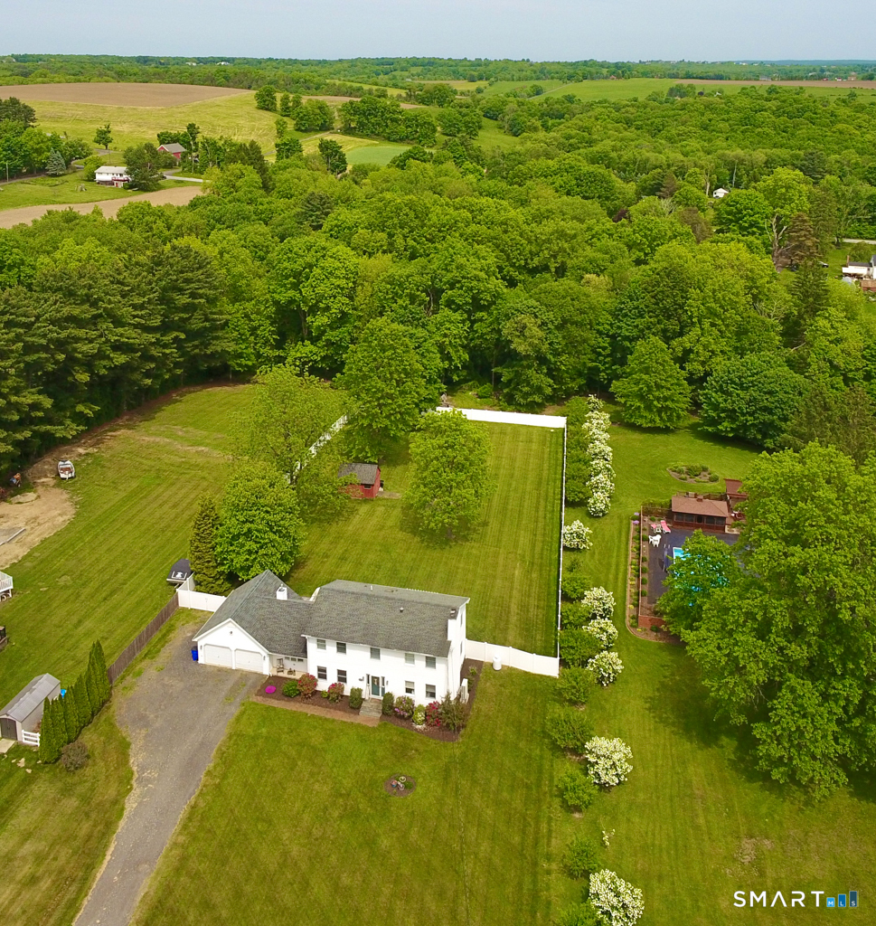 109 Harrison Lane Bethlehem, CT 06751 - Photo 24 of 28 a view of a lake with a city