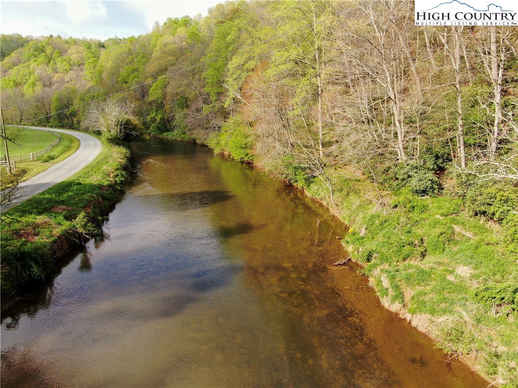 Big Hill Road Todd, NC 28684 - Photo 12 of 45 a view of a pathway both side of house with yard