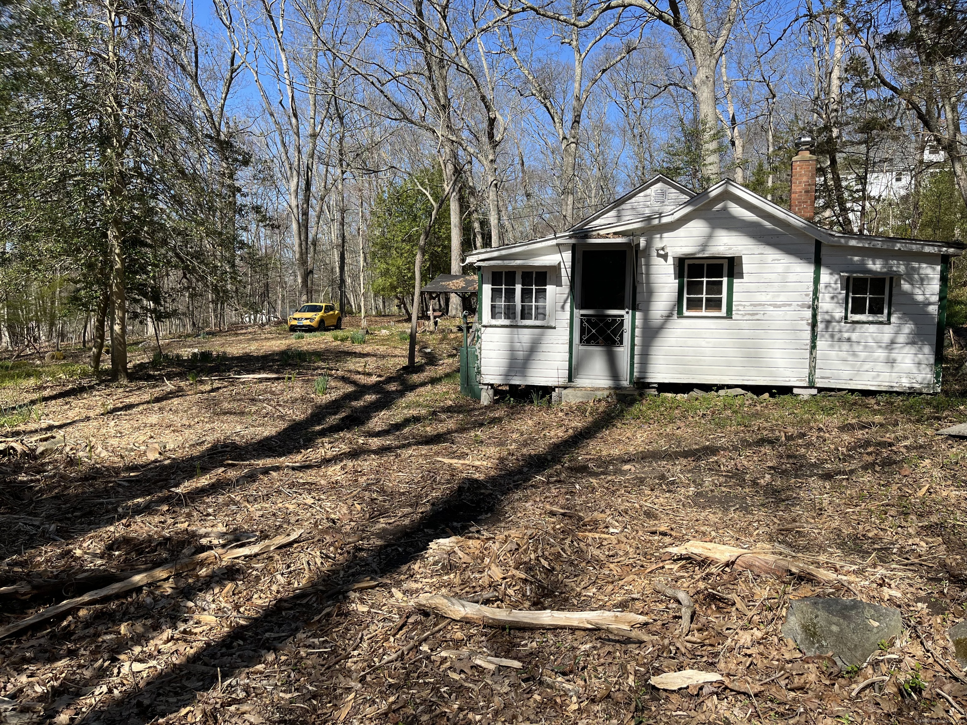 a house with trees in the background