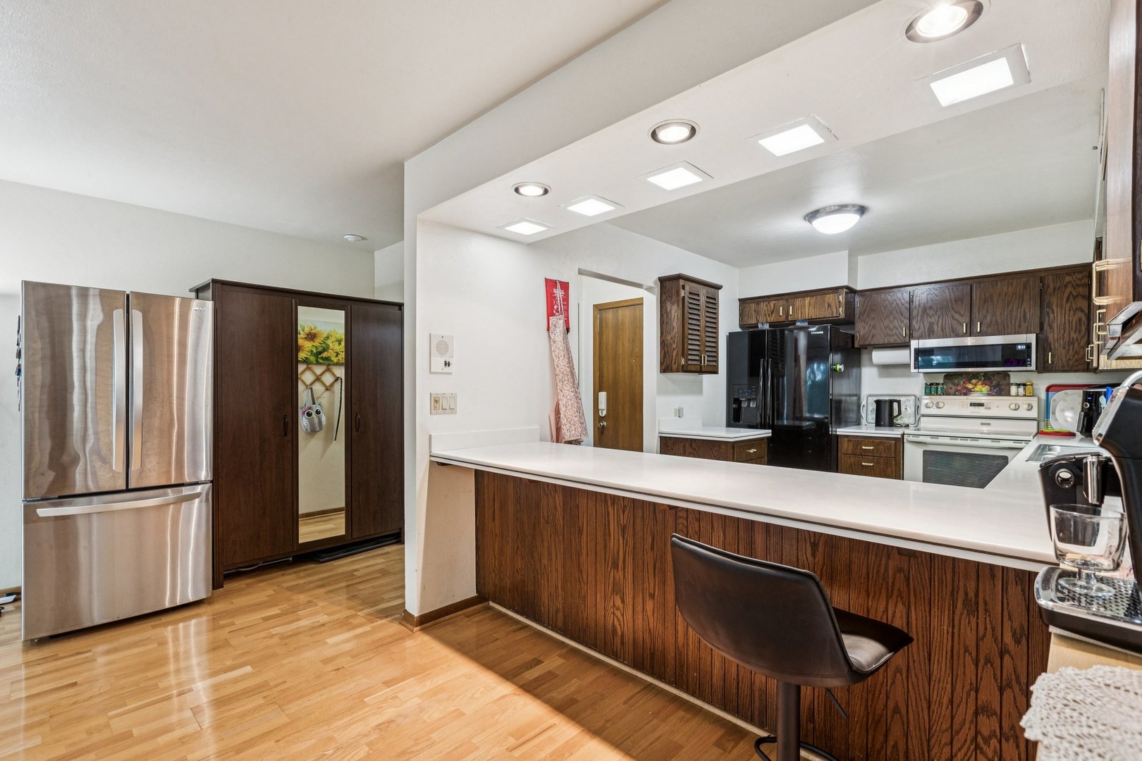 522 East Algonquin Road, Unit 201 Schaumburg, IL 60173 - Photo 11 of 27 a kitchen with stainless steel appliances granite countertop a refrigerator and a sink
