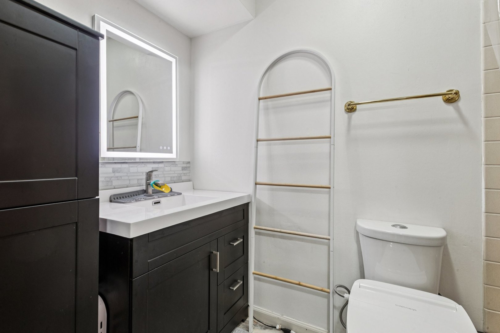 522 East Algonquin Road, Unit 201 Schaumburg, IL 60173 - Photo 19 of 27 a bathroom with a sink a toilet and mirror